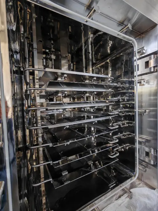 trayless tilting shelf design of industrial lyophilizer for pharmaceutical manufacturing